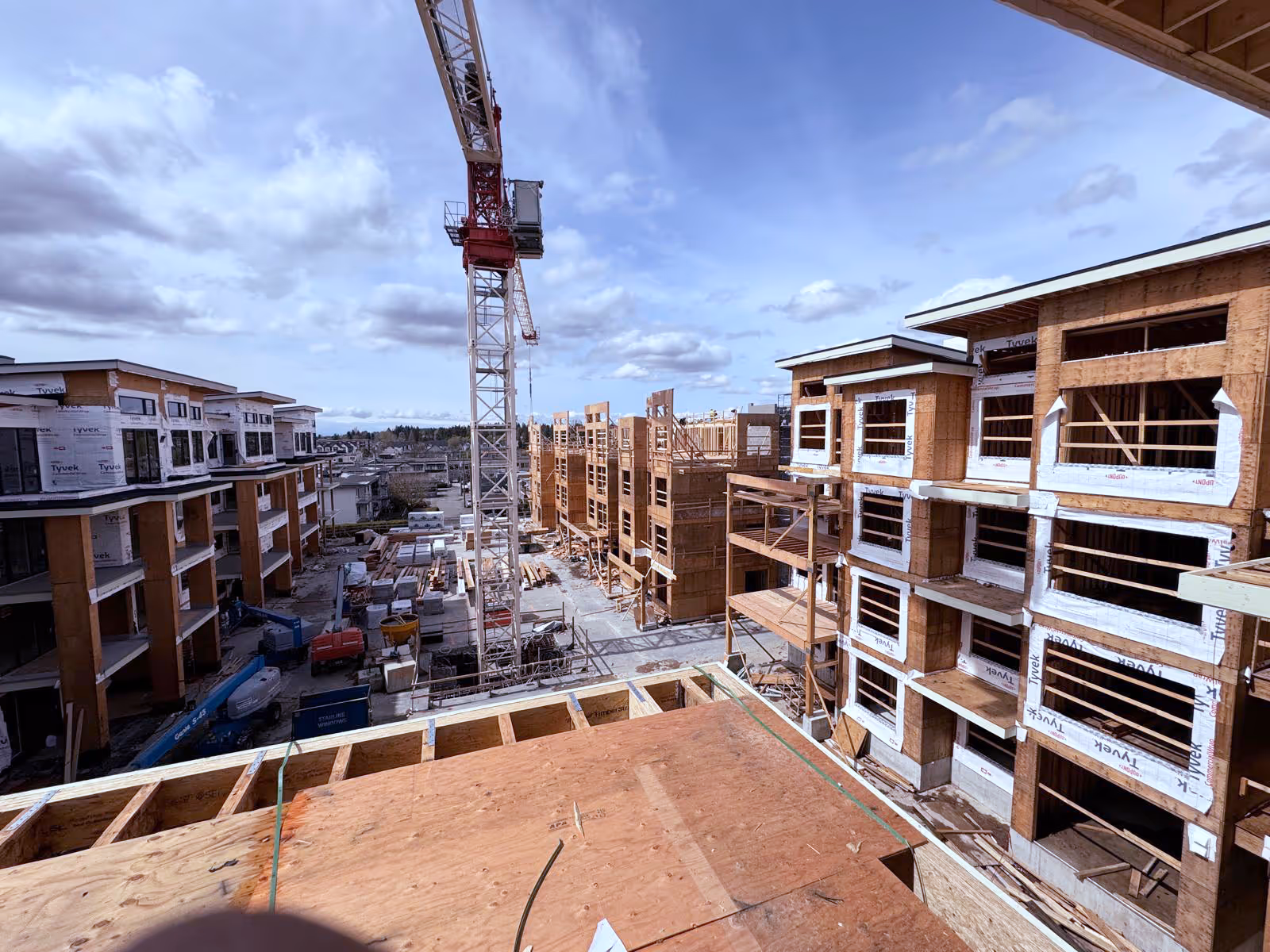 Multi-family townhouse framing project at sunset by Jas Construction in British Columbia
